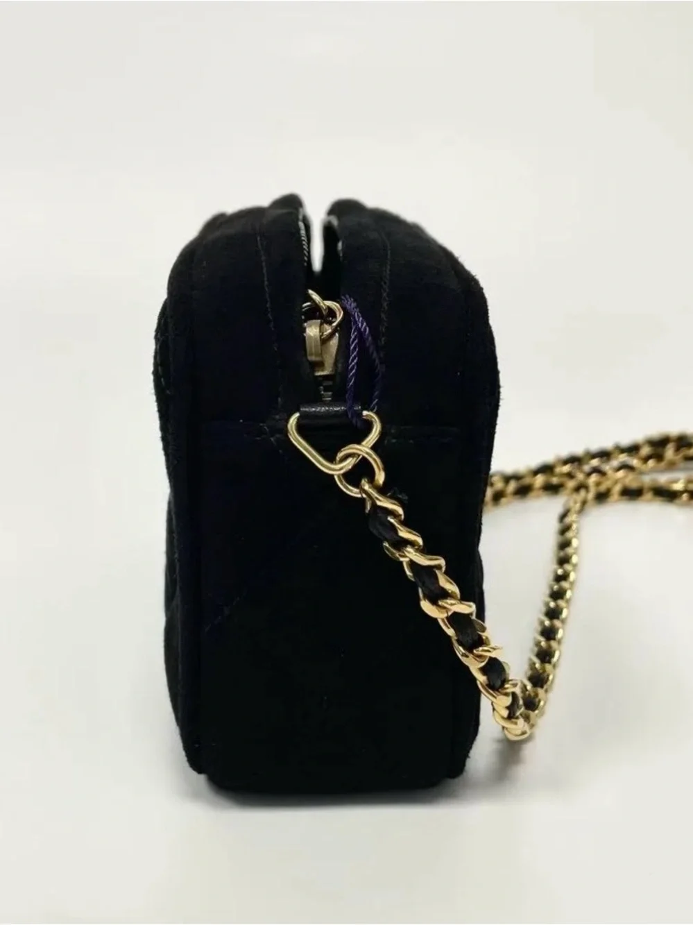 CHANEL Black Quilted Crossbody Bag with Gold Chain and Tassel